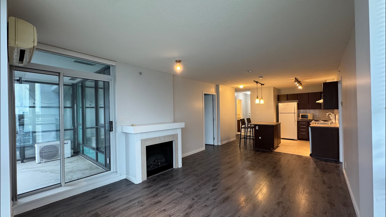 CORNER UNIT 2BED 2BATH PLUS LARGE DEN AT THE HEART OF COQUITLAM