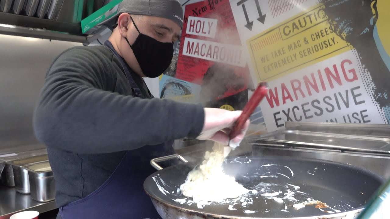 Melted Cheese, Yummy Mac&Cheese. Macaroni Drenched in Melted Cheese. London Street Food