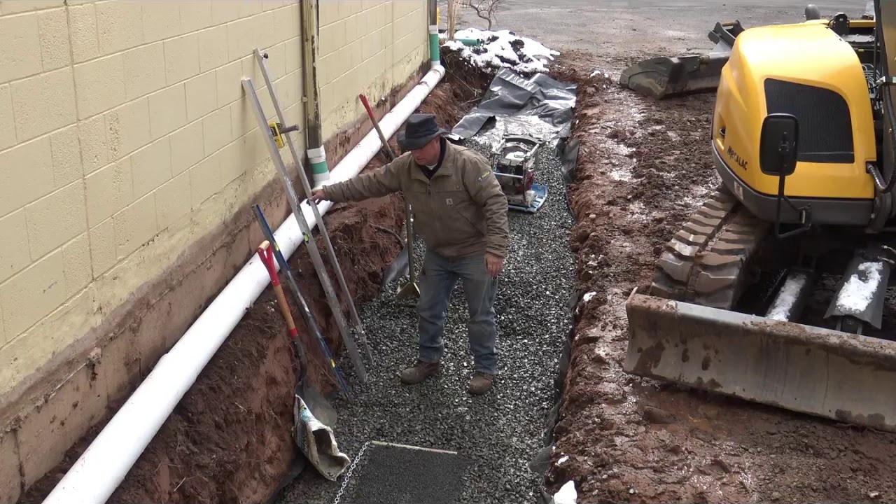 Installing a Perfectly Level Retaining Wall Base with the Quick-E-Wall Screed