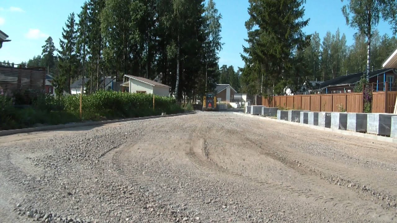 Gehl 5240 grading gravel with laser receiver