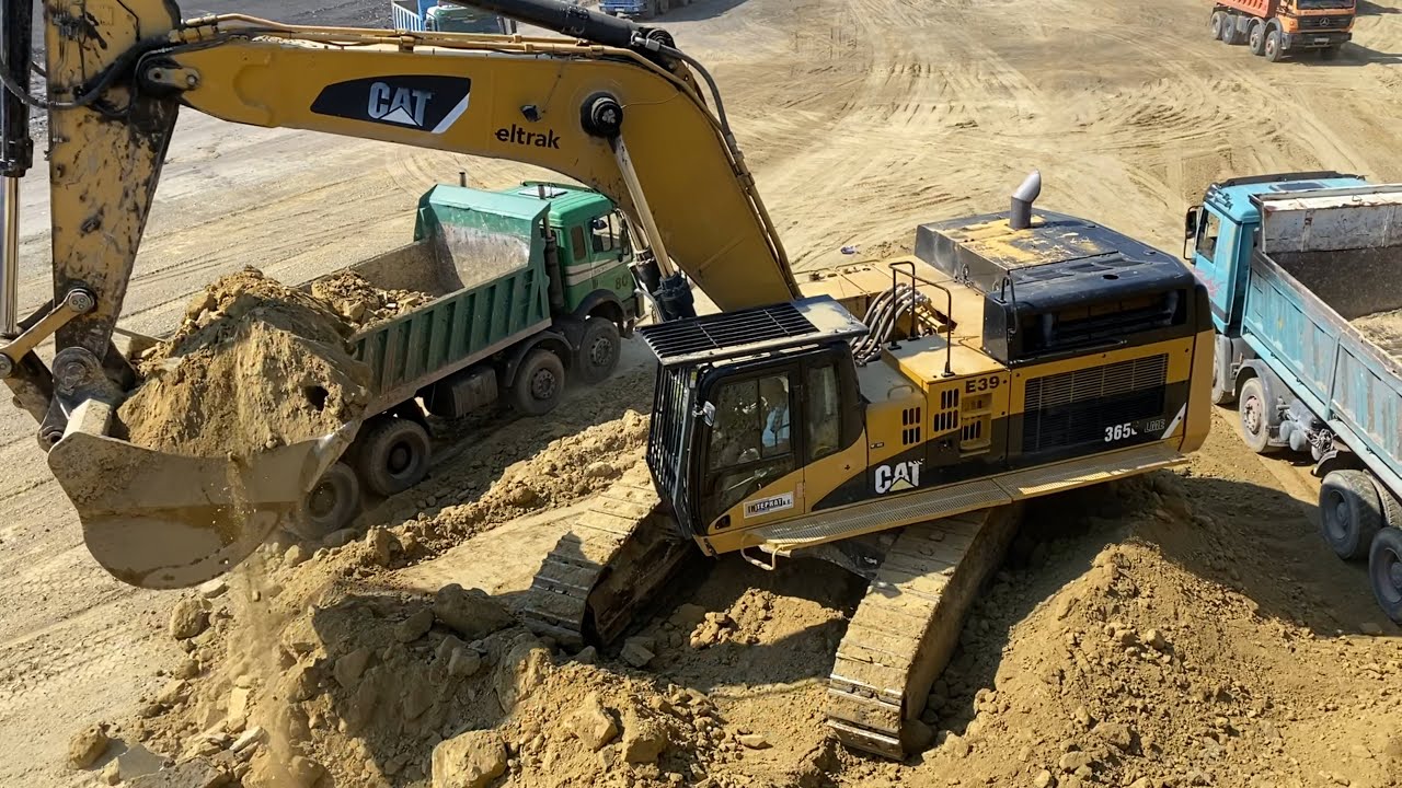 Caterpillar 365C Excavator Loading Trucks - Interkat SA