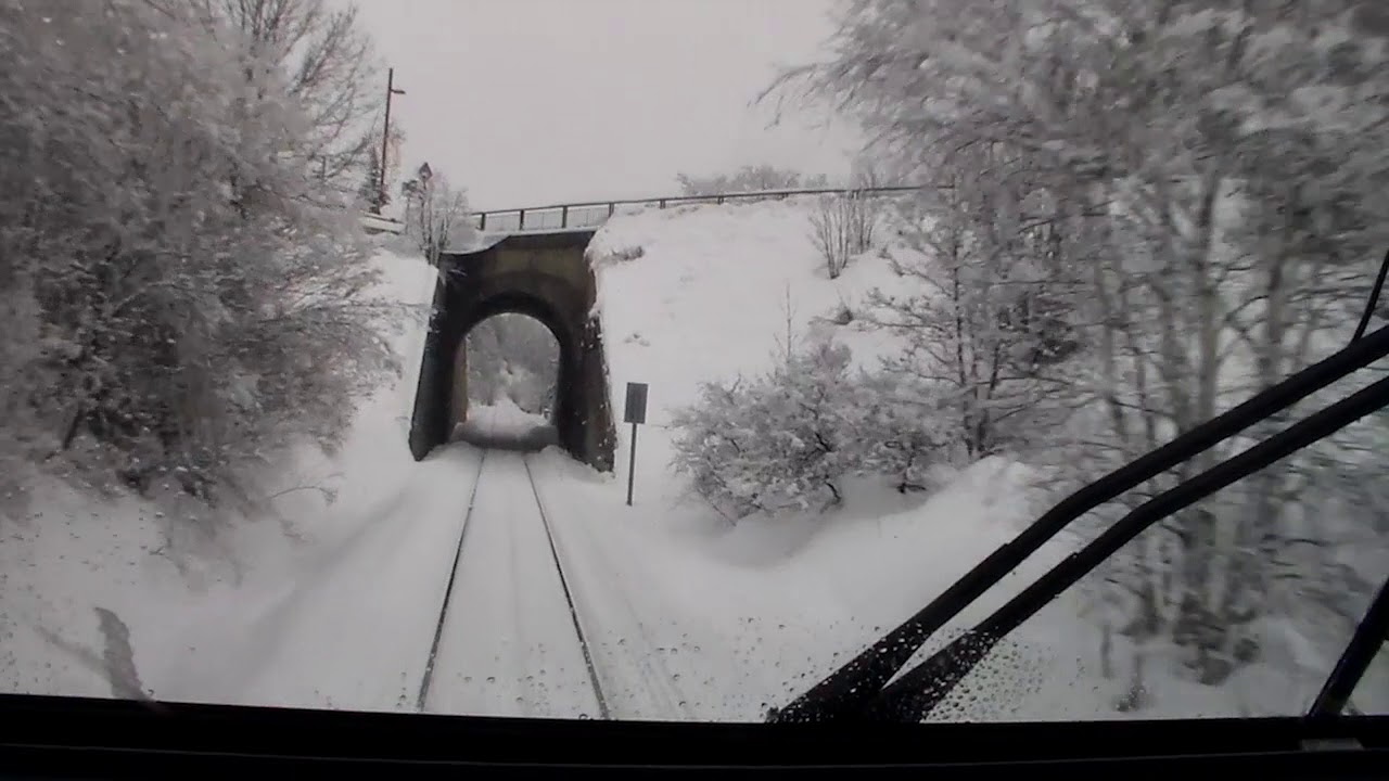 [extra] en cabine de l'agentiere a briançon. train cabin ride in the french alpes on the snow.