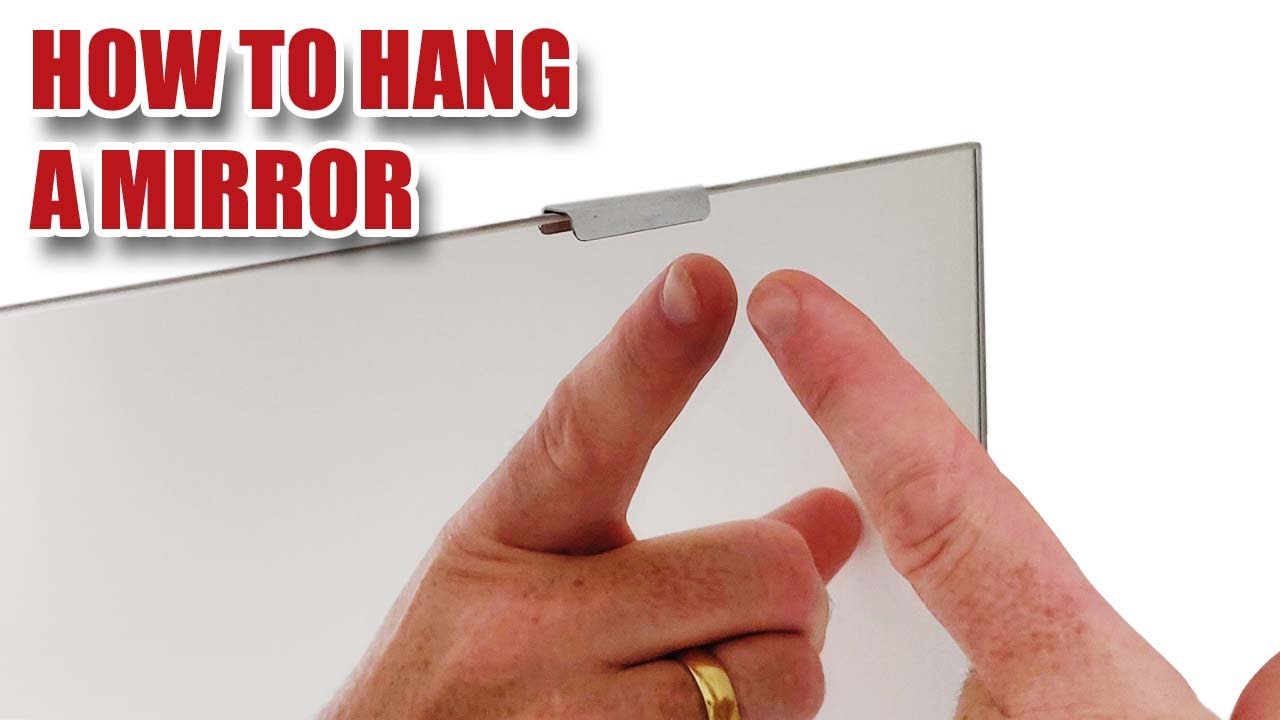 How to Hang a Mirror ...and a toothpaste tip?!?