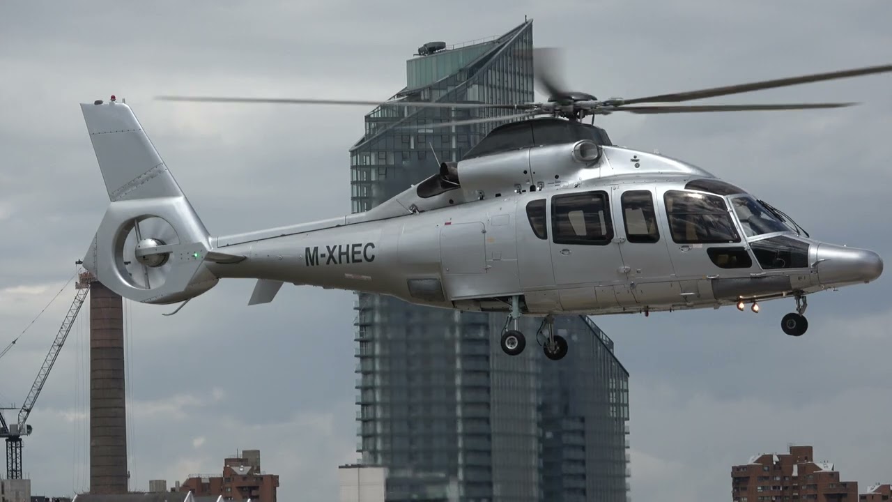 M-XHEC EC155 LANDING AT BATTERSEA HELIPORT LONDON 0107