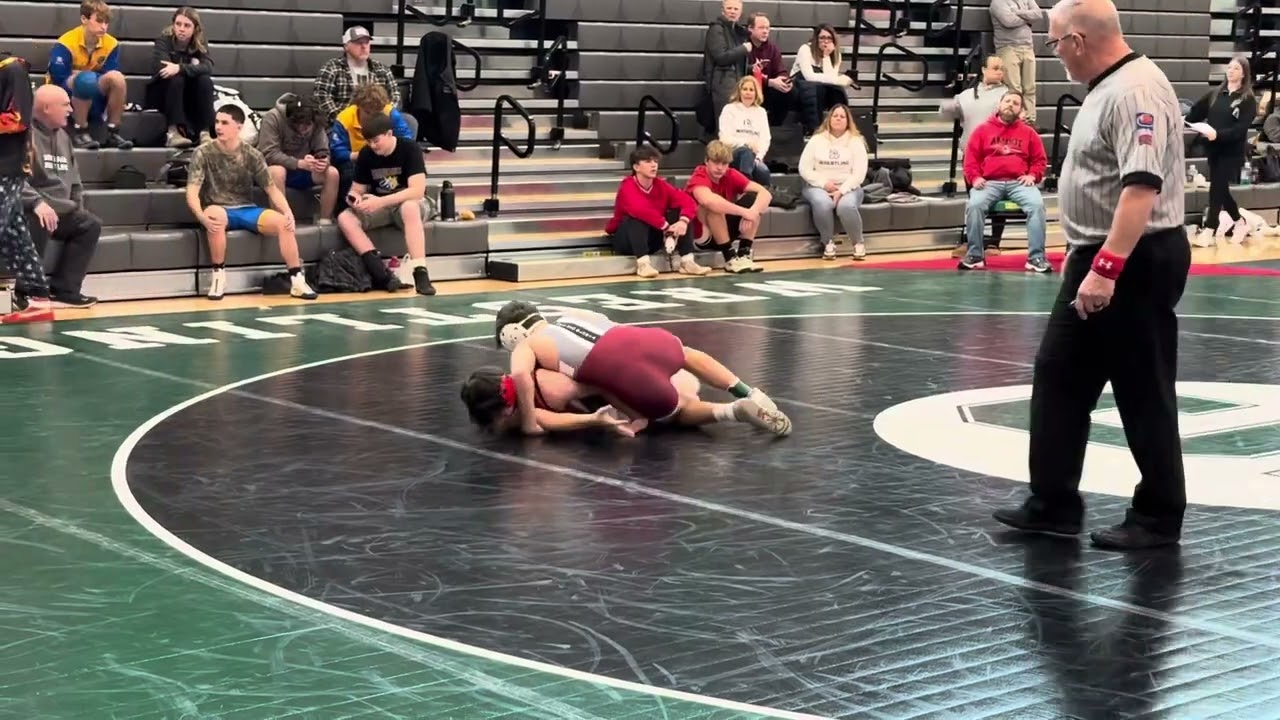 2024-12-07 Lincoln Hoger (Wheaton Academy) fall over Chase Montavon (Amboy (Fall 2:46)