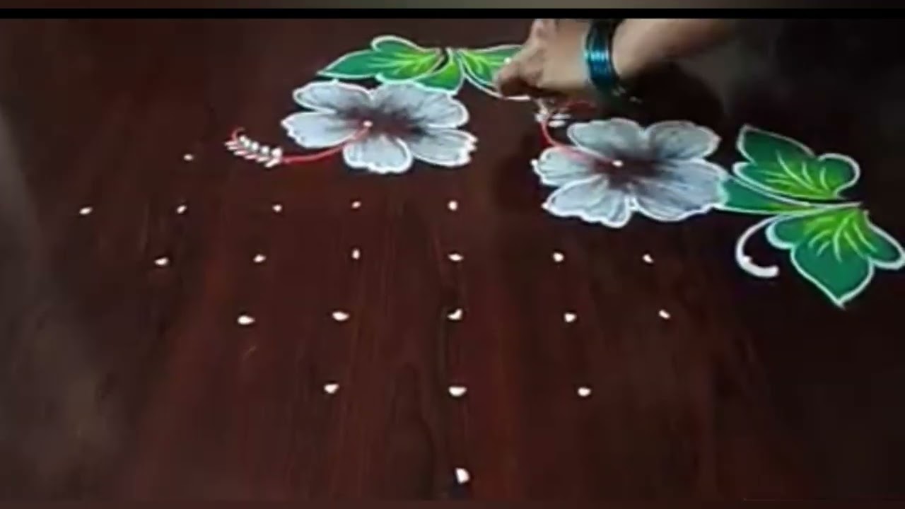 White sembaruthi poo kolam