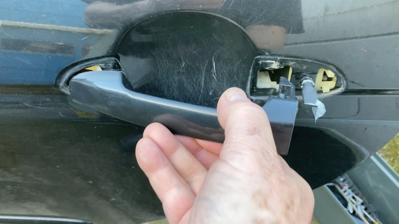 How to Replace the Rear Door Handle on a 2009 Kia Spectra