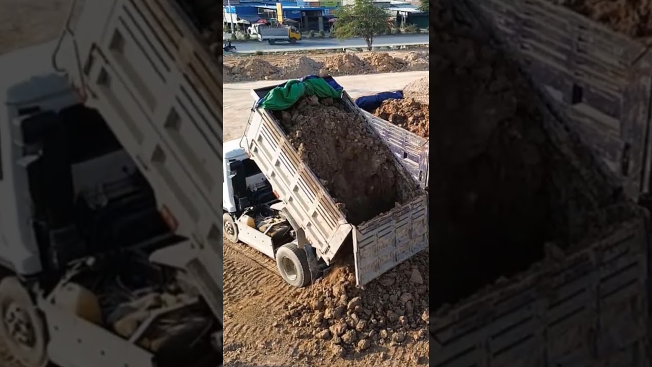 Dump Truck Unloading Land 