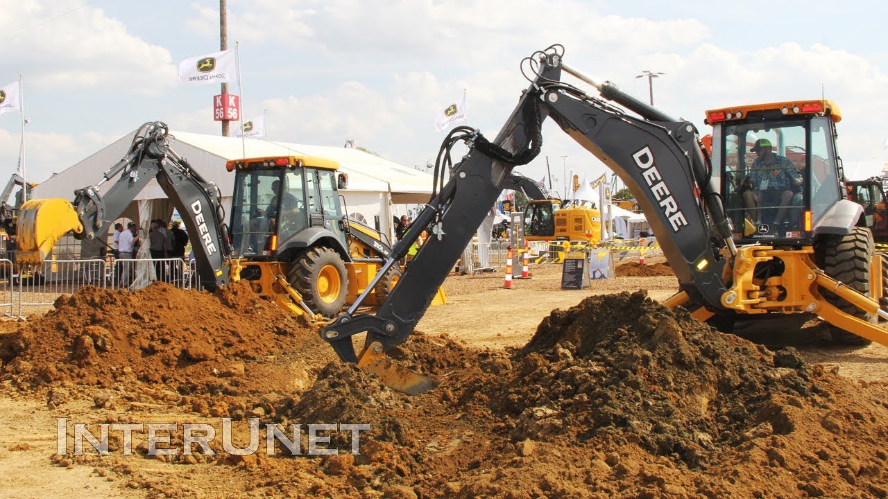 Two Backhoes Digging - Deere 710L and Deere 310L ep Demonstration