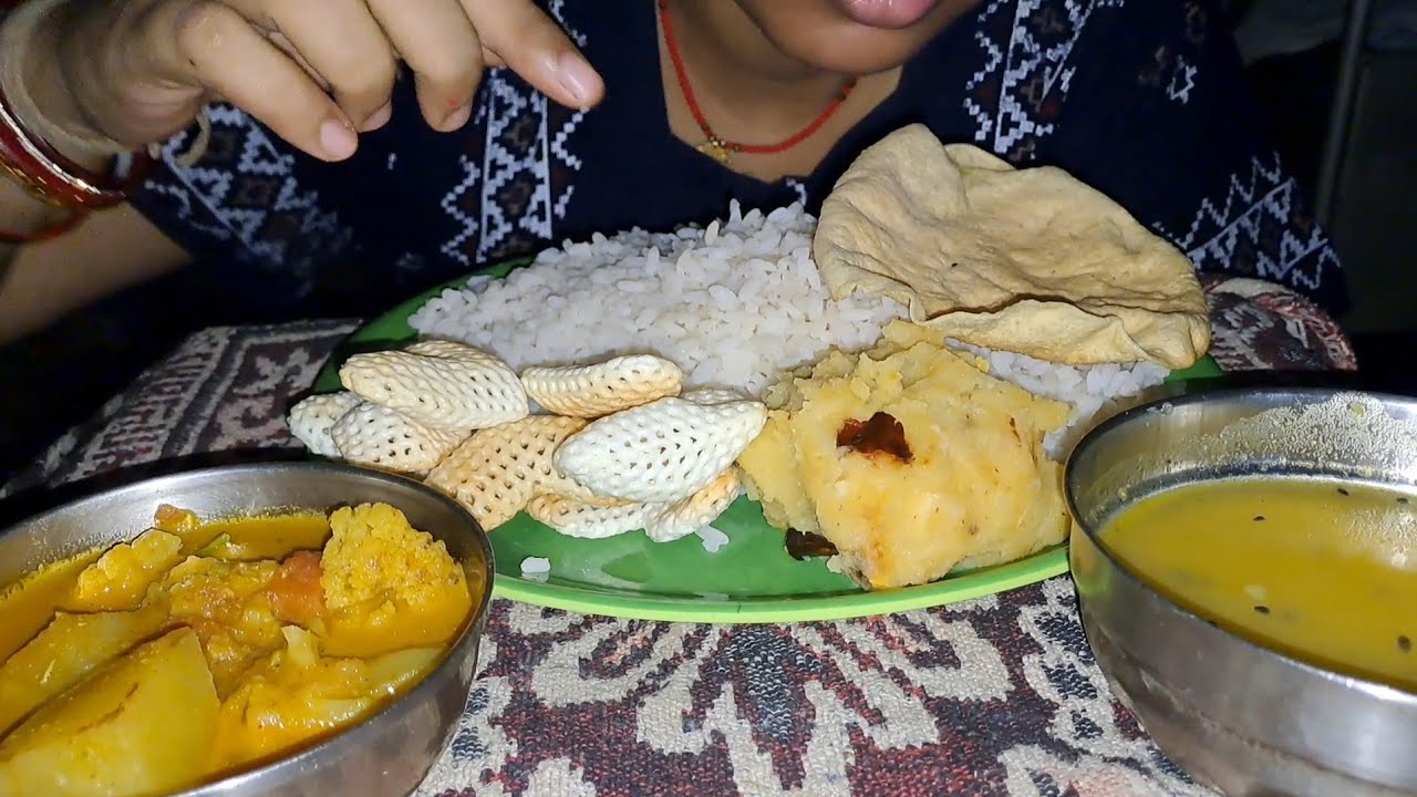 Eating Rice Daal With Alu Govi Curry And Alu Chokha