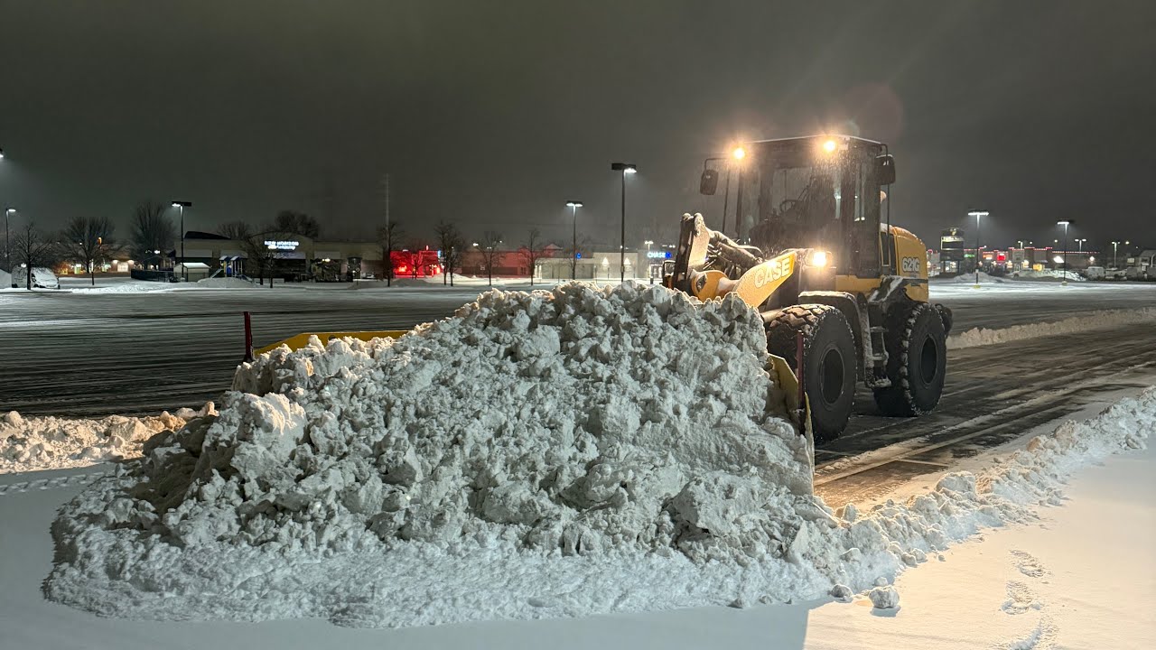 Snowplowing with a $250,000 snow plow setup. Case 621 with Metal Pless 12-24 snowplow.