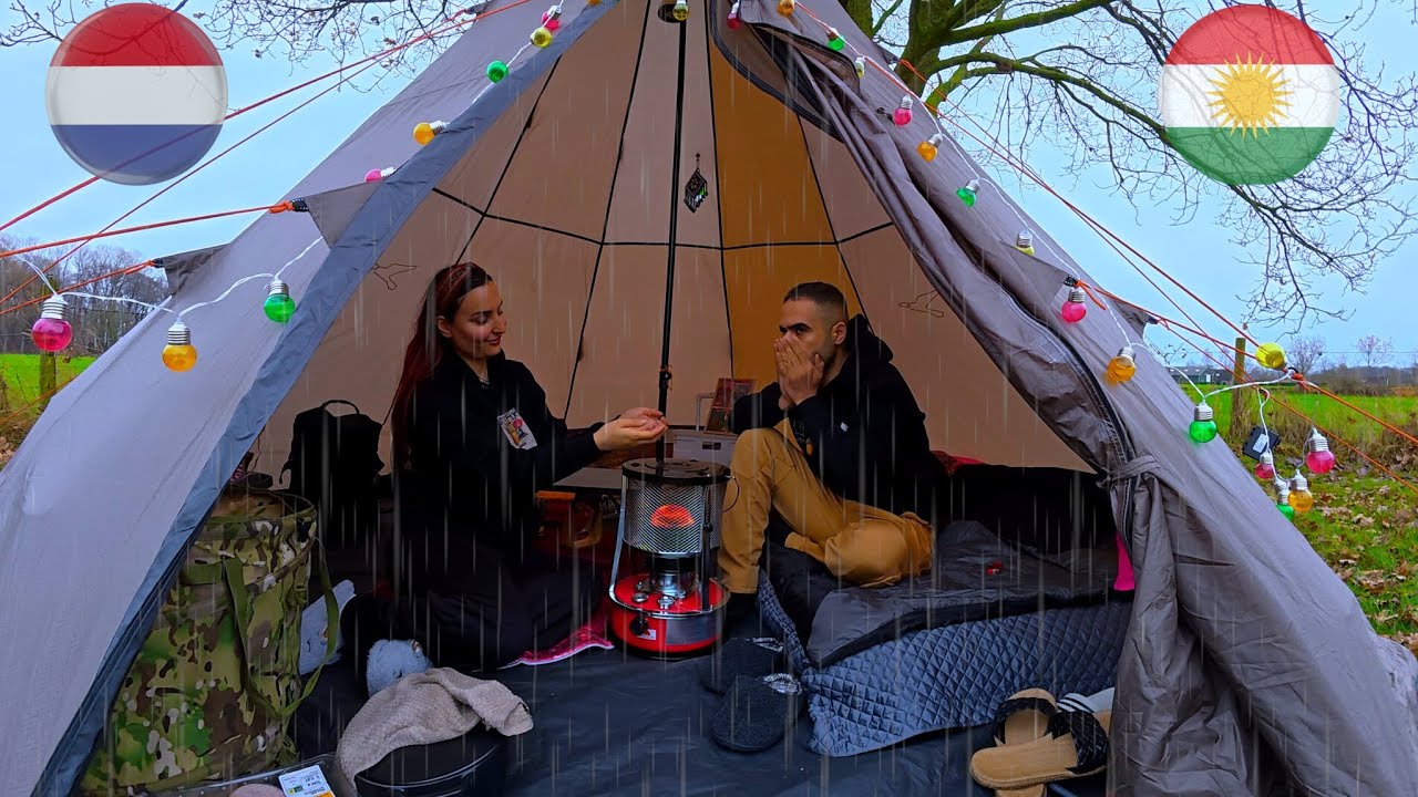 Camping in heavy کەمپکردن لە ژێر باران و بایەکی زۆردا rain and wind