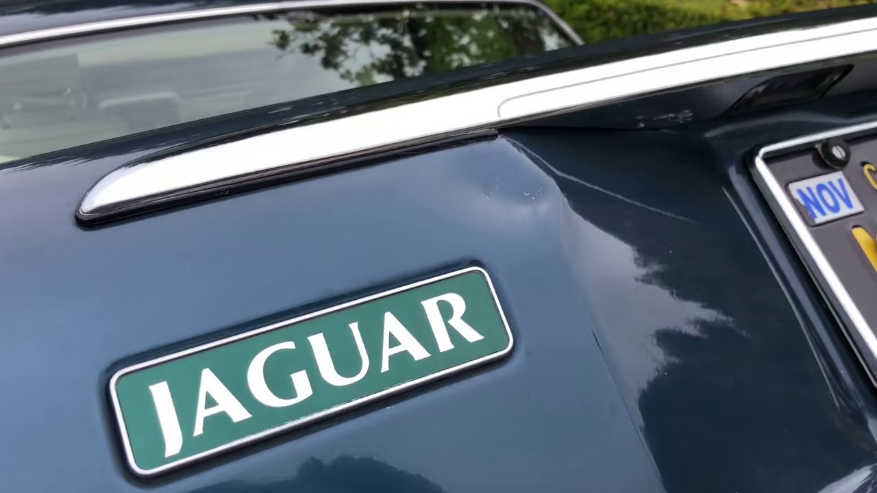 How to remove dents without rods and drilling holes. Jaguar trunk lid dent fixed with DentDial.com