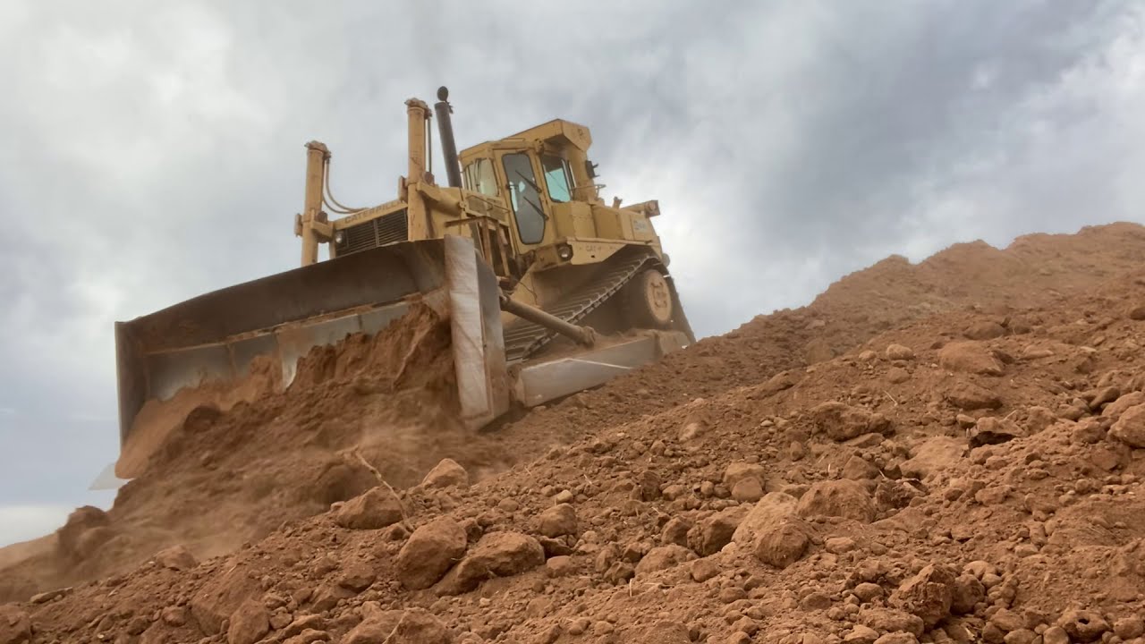 Pushing dirt with a D9L dozer