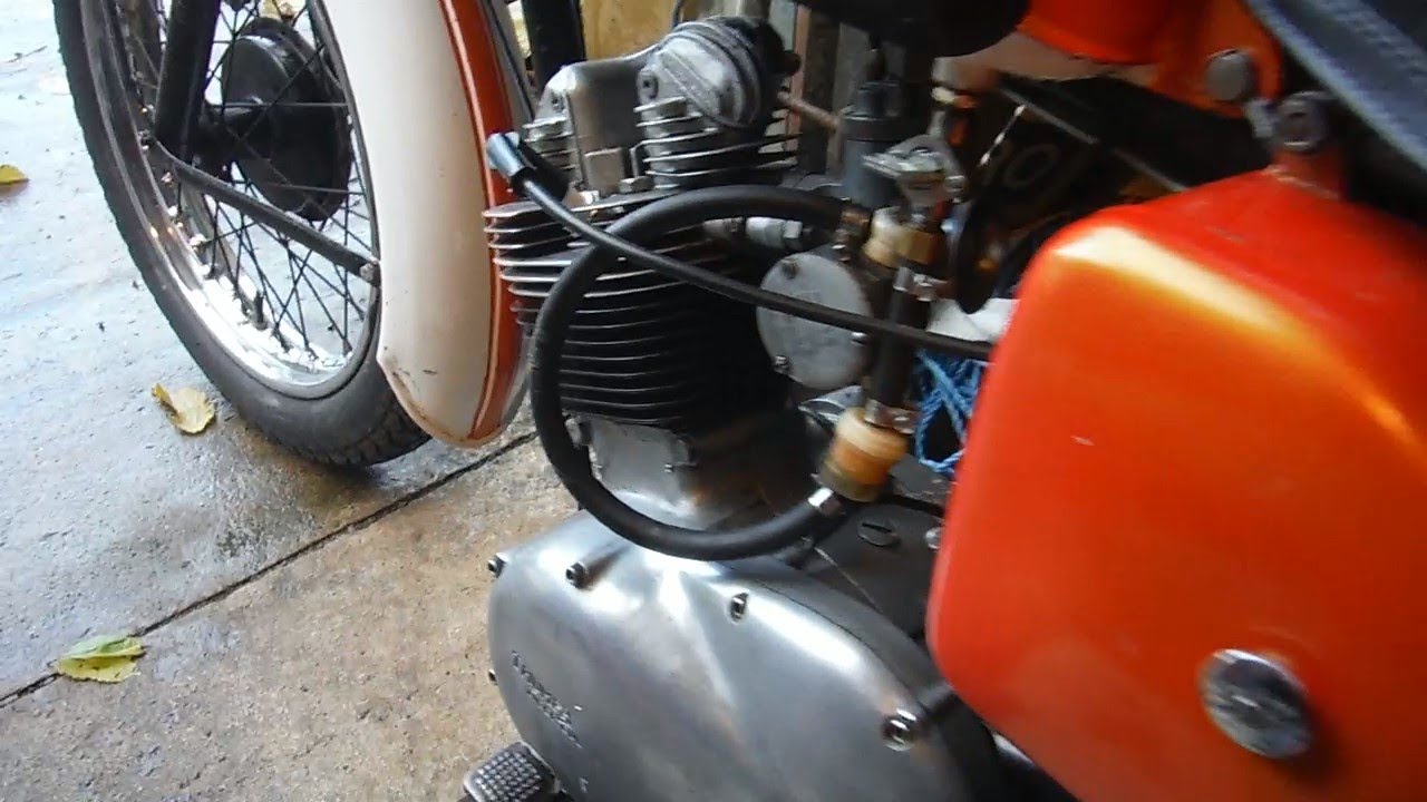 How to tell if a Triumph Tiger Cub engine has a standard or a sports cam without stripping it down.