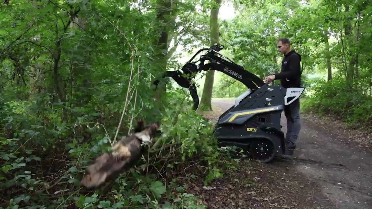 SHERPA Z50T (on Tracks!) Mini-loader with Log Grab attachment in action
