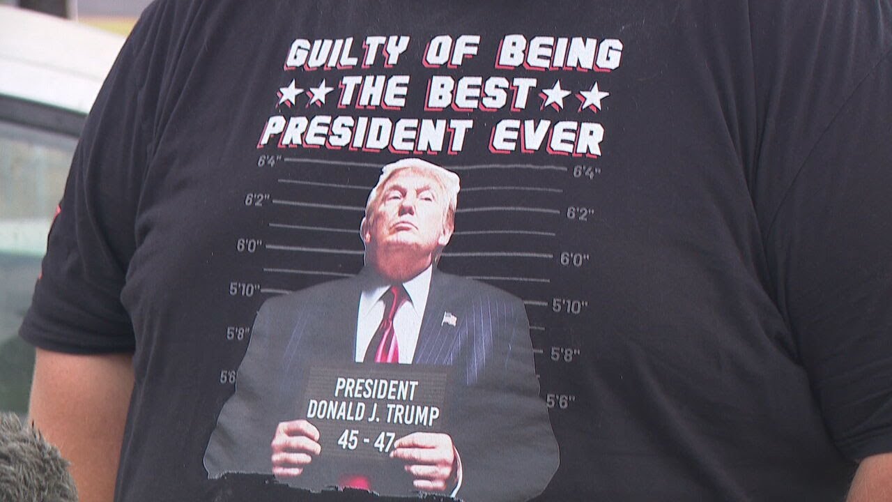 Controversy after voter in Trump T-shirt confronted by election official