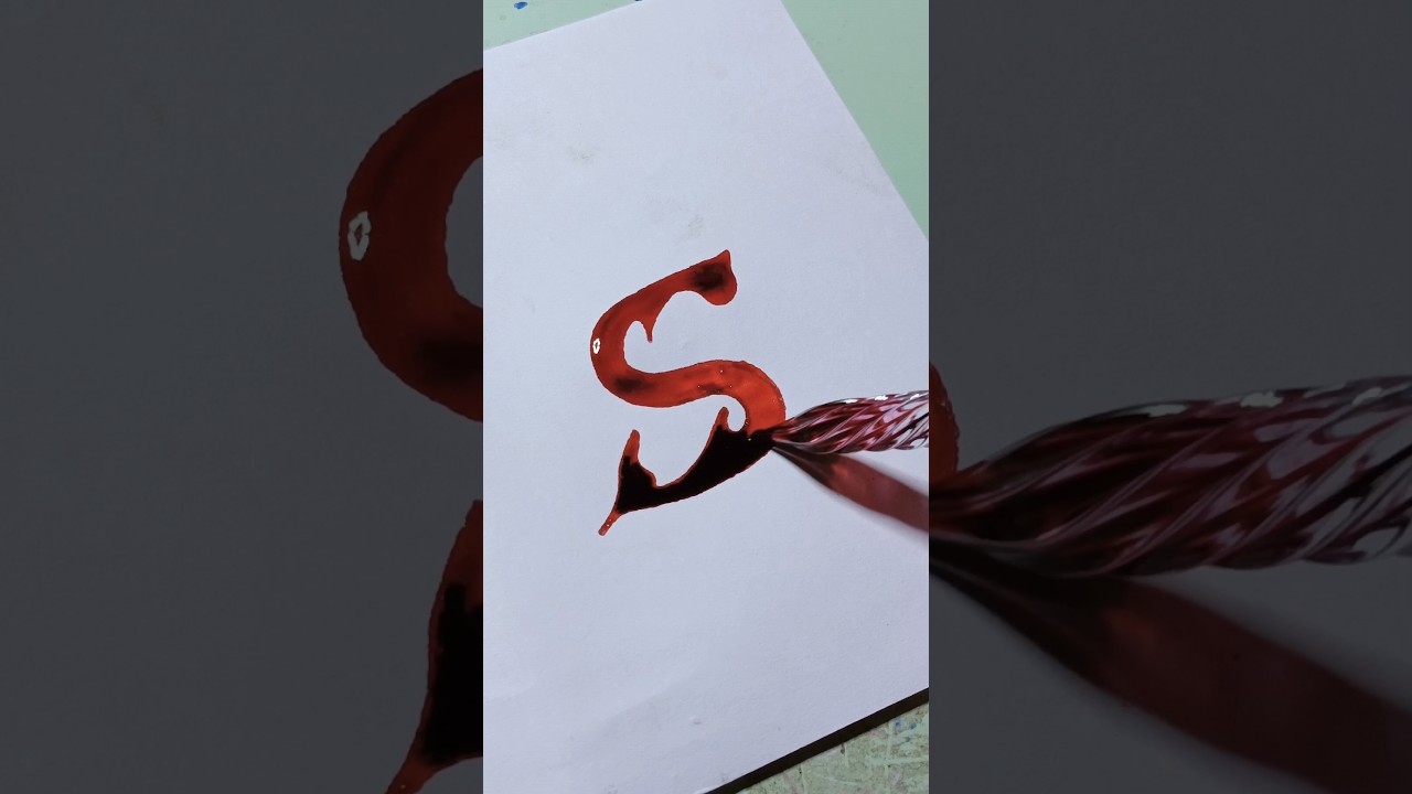 Glass pen lettering word using s 