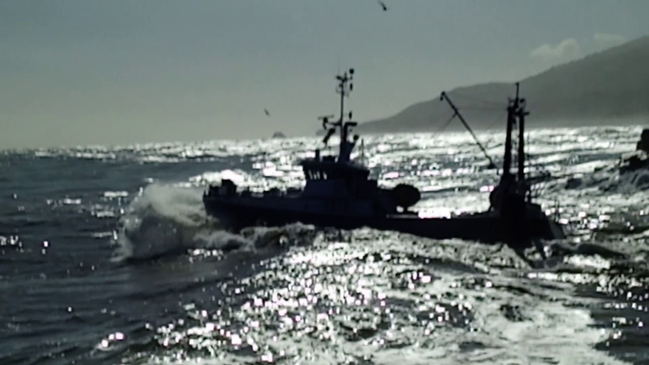 Fishing boat crossing the Greymouth Bar