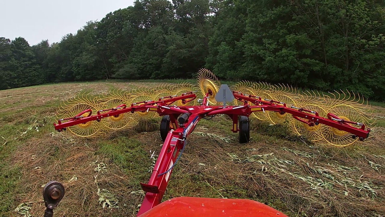Raking hay with a new holland 1022 procart rake