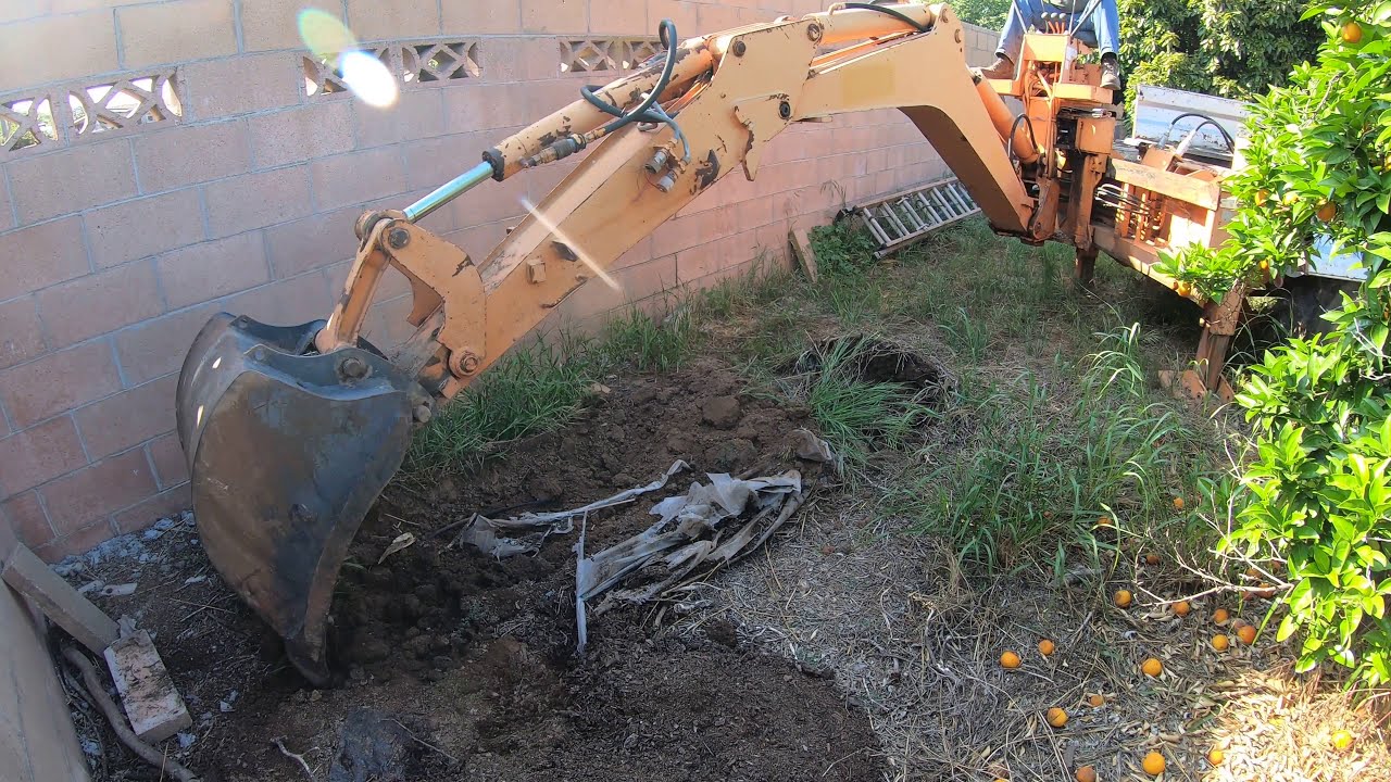 Time lapse Unimog backhoe digging (Schaeff HT12)