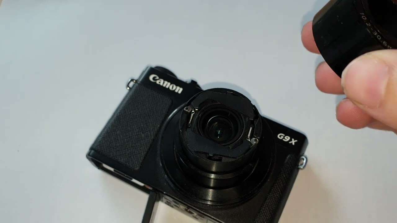 how remove front lense cap canon G9x mark ii, in case of stuck lense cover blades.