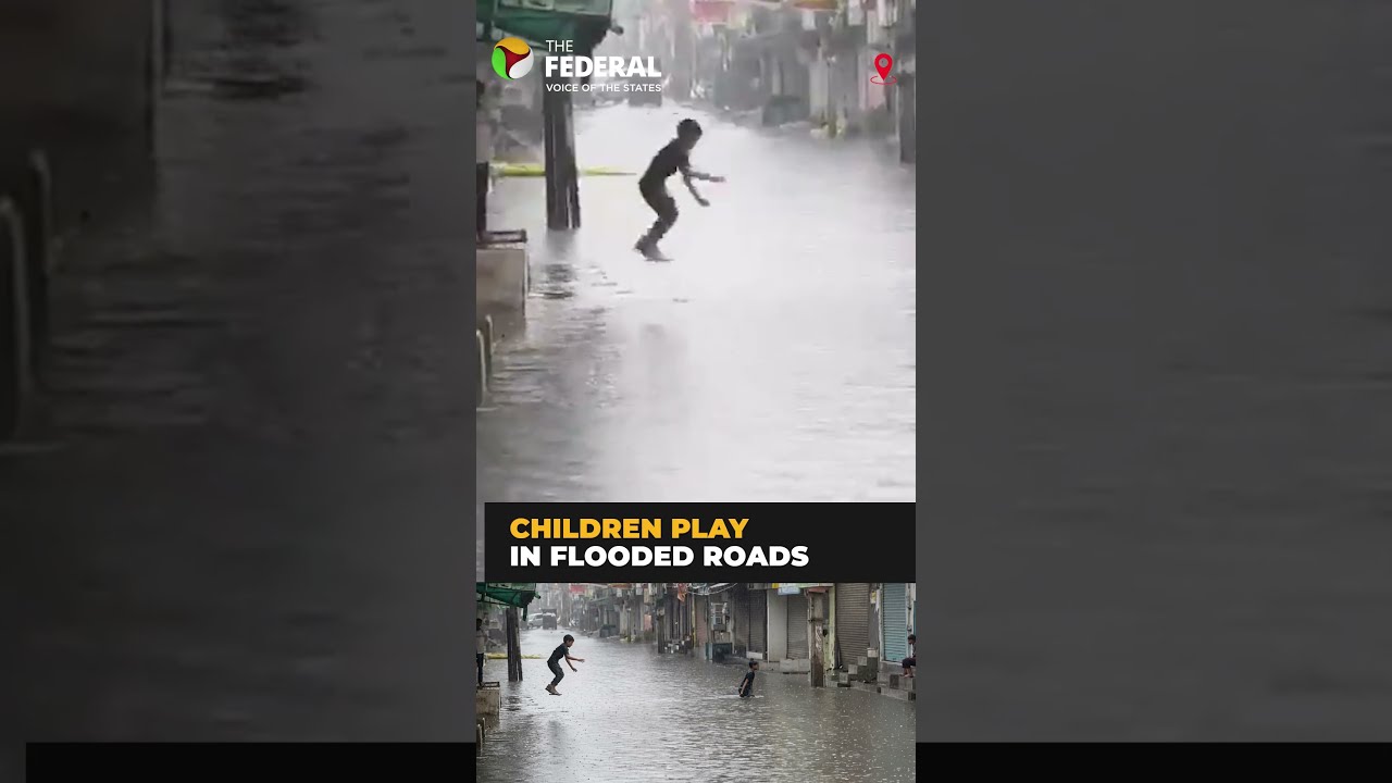 Children turn Delhi&rsquo;s flooded streets into playgrounds | #shorts