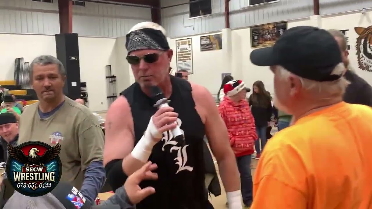 SECW    -    BRAD LYNCH ATTACKS MIKE JONES!!         240 ROME ST TEMPLE GA