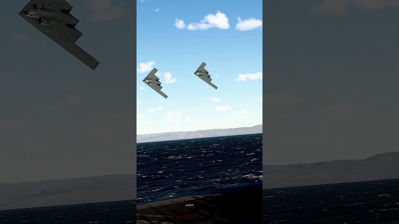 IRAN: A pair of B-2 Spirit stealth bombers flies by a US Carrier group in the Persian Gulf