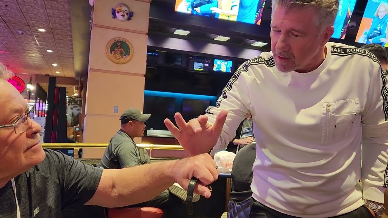 Banachek performing impromptu watch trick