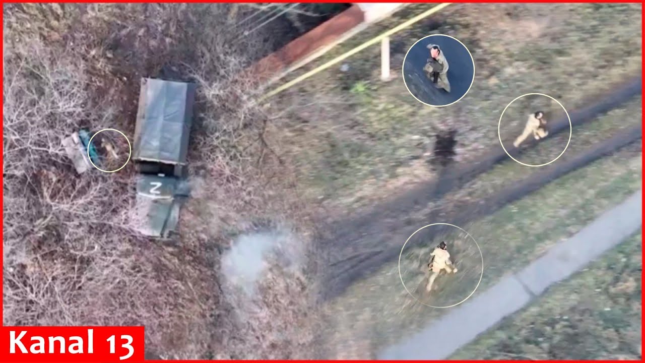 Russian driver struggles with the drone - Getting out of the truck he starts running