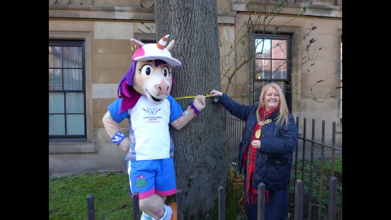 Lord Provost of Glasgow and Finnie, the mascot for Commonwealth Games 26 measure the Argyle Ash tree