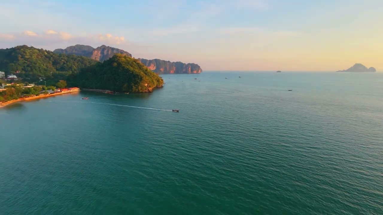 Golden waves of Nopharat Thara Beach Krabi Thailand Captured on DJI Neo 2