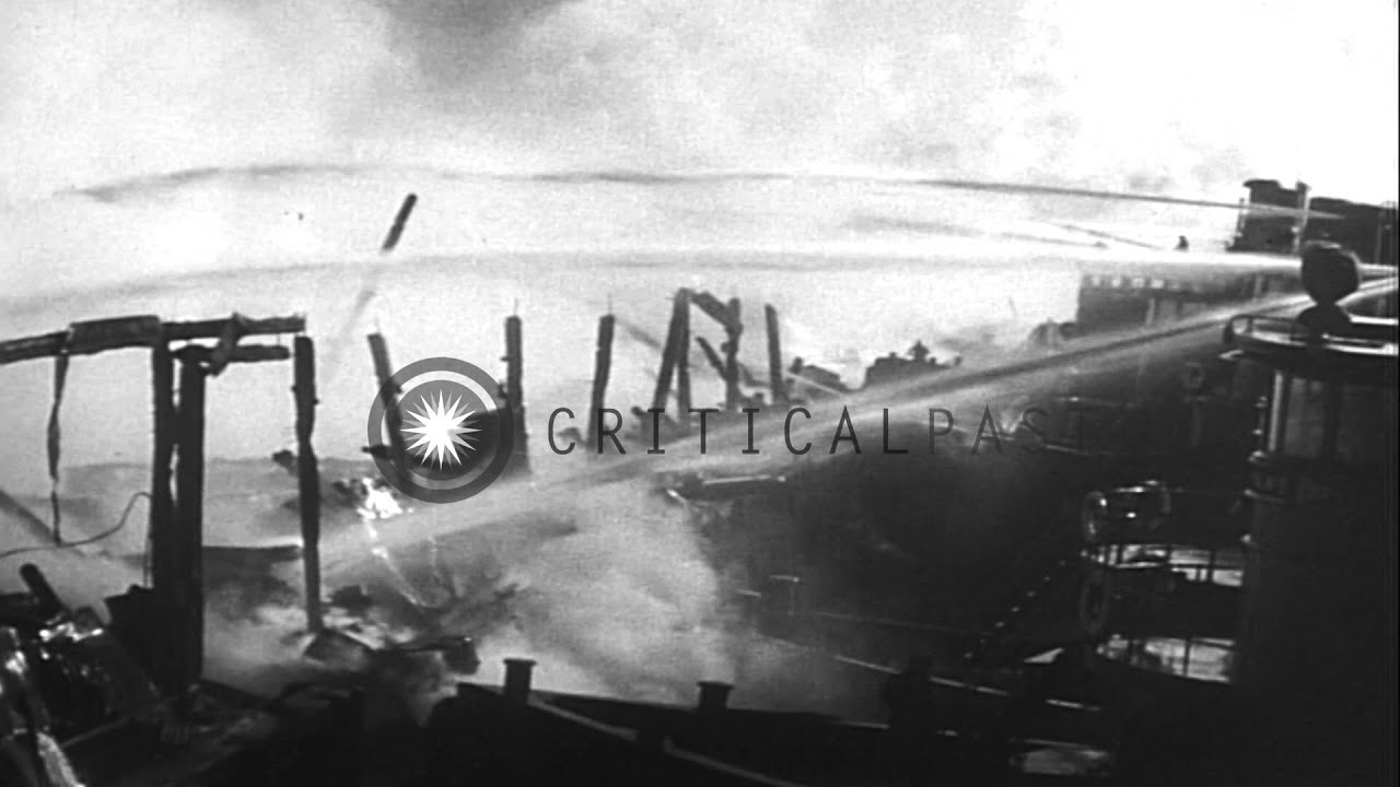 Two fires:  Fire at railroad pier at Weehawken in New Jersey; and fire at Palace ...HD Stock Footage