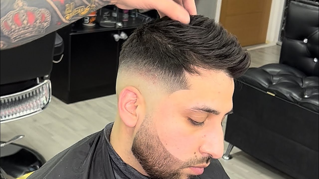 Desvanecido más barba y peinado