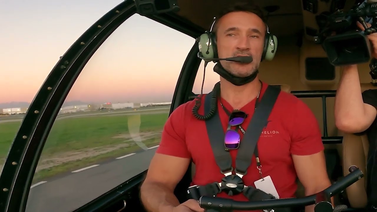 How do I actually hover in a Robinson helicopter