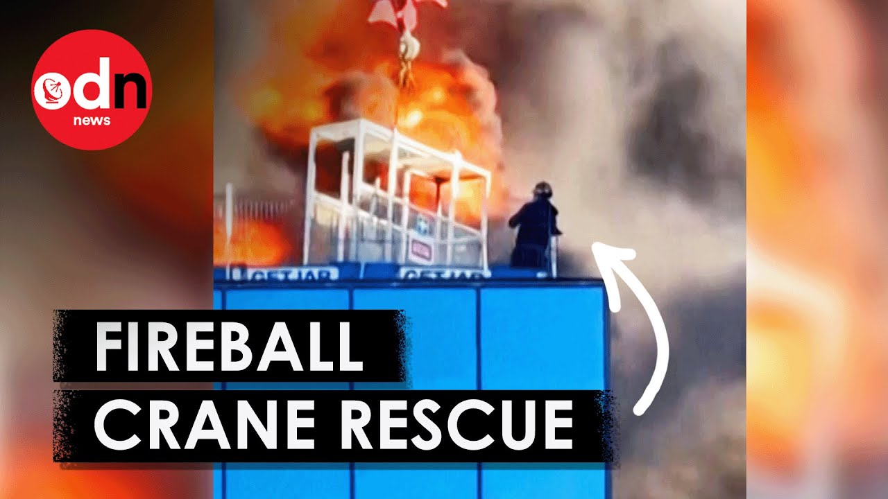 Incredible Moment Crane Operator Saves Man From Towering Inferno