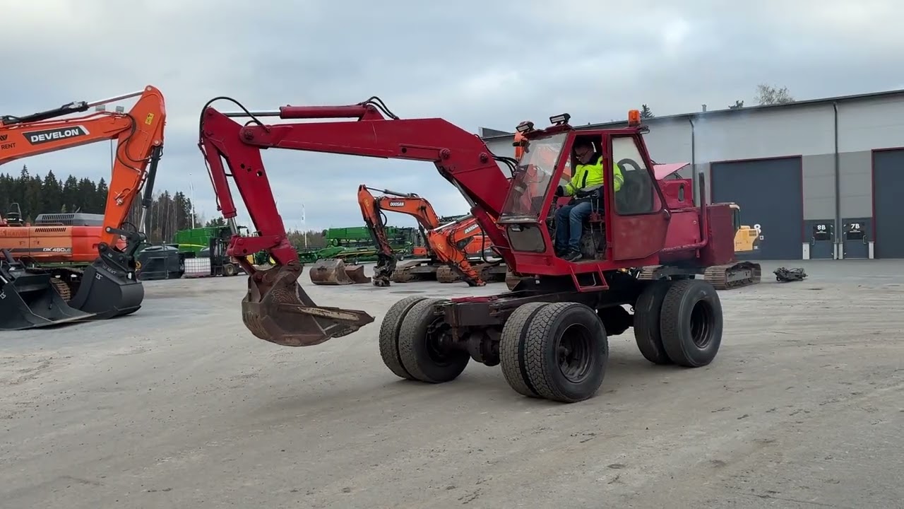 Huutokaupat.com myy Atlas AB 1202 kaivinkonetta