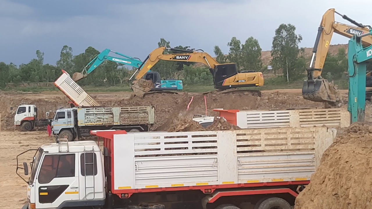 ฝูงบินรถขุด ถล่มอ่างเก็บน้ำ สามัคคี คือ พลัง KOBELCO VS SANY ดั้มจัด excavator and truck EP.6988