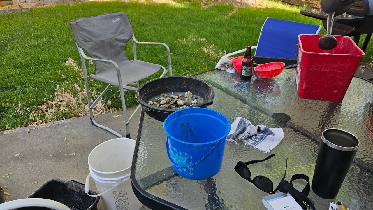 soaking the clay  off in water, looking for opals