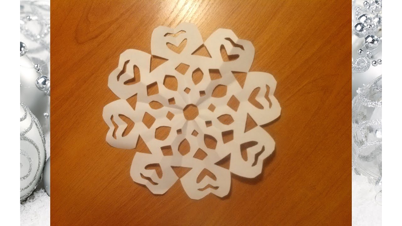 Hvordan lage et sn&oslash;fnugg ut av papir