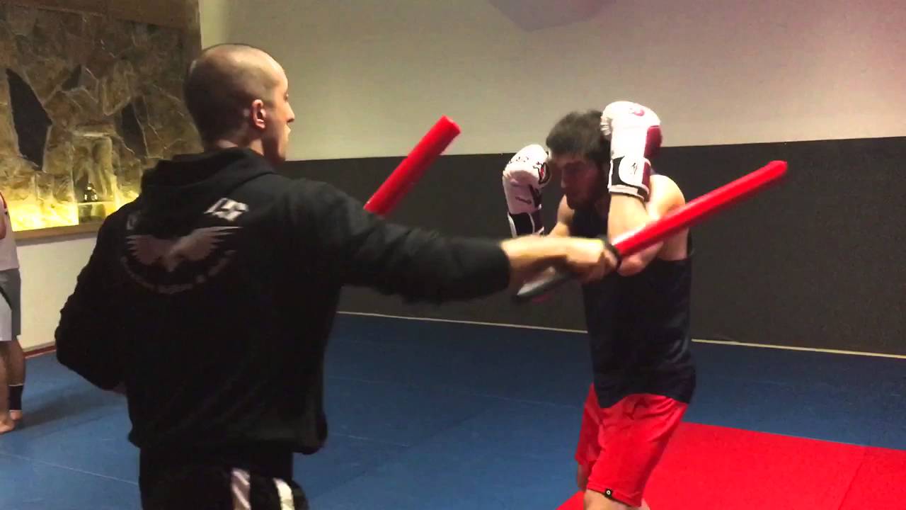 Dagi training boxing with sticks
