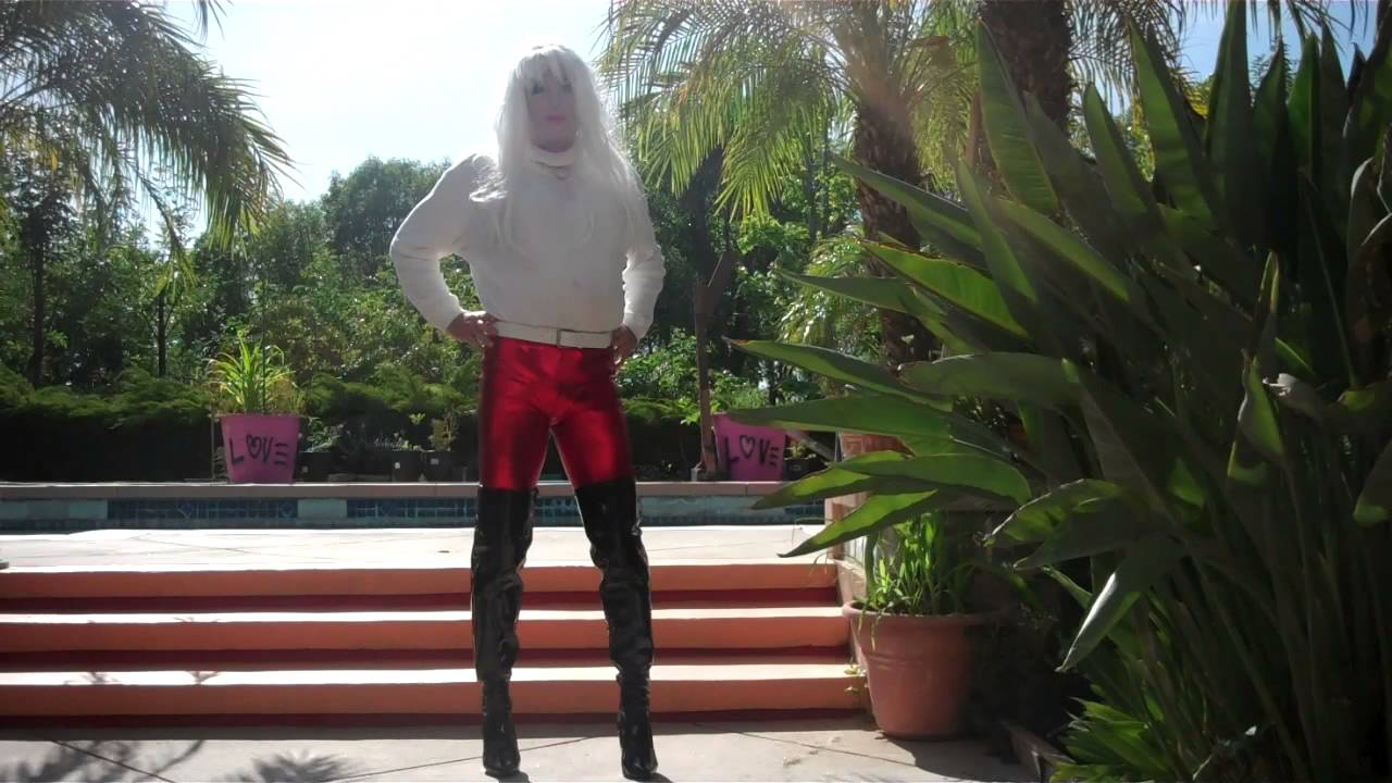 Kellly in red disco pants and thigh high boots