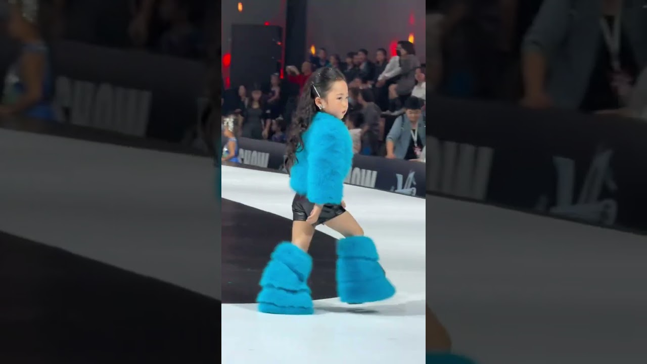 Sassy girl shows off her catwalk skills