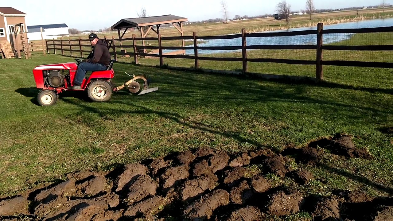 Plowing with Wheel Horse C145 and Brinly Plow