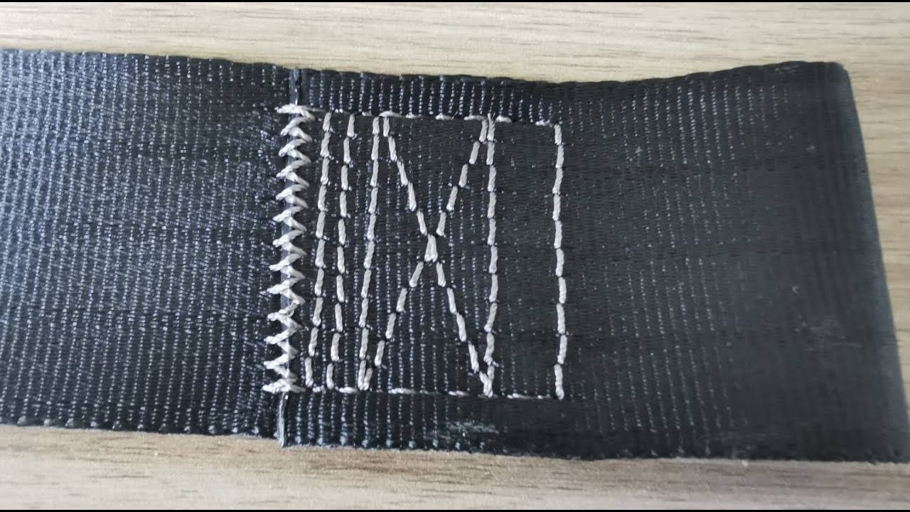 Automatic seat belt sewing machine