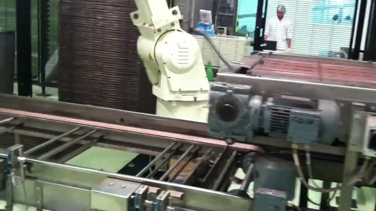 KAWASAKI Palletizer for Backing Lids
