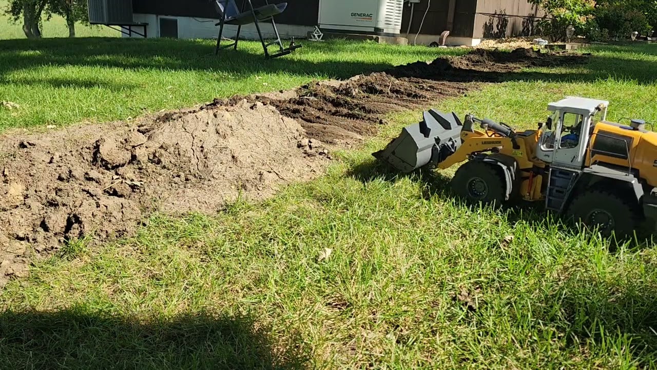 Backfilling the trench w/ XDRC 580 loader and DXR2 D10 dozer.   PART 2
