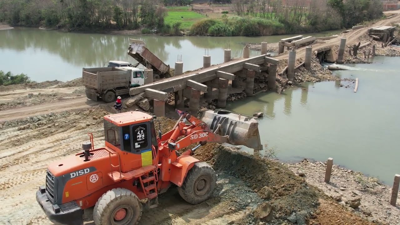 Start a New Project Build Temporary Road with Fantastic Processing Truck And Loader Spreading Dirt