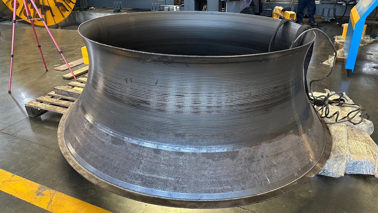 Inlet cone spinning and flanging machine for centrifugal fan process